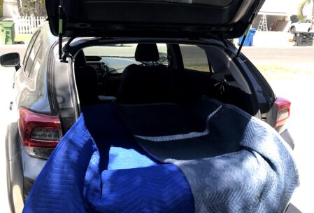 Movers blankets in a hatchback car